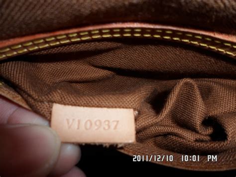 authenticate louis vuitton serial number.